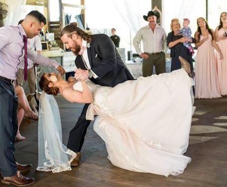 Bob Lee daughter Sara Lee with her husband Wesley Blake on their wedding.